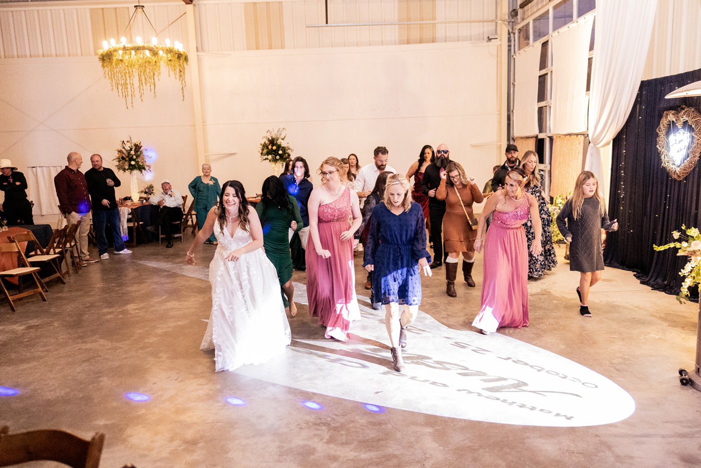 the Grand Carriage Hall with bride and guests dancing.  Felicia Treadway Photography